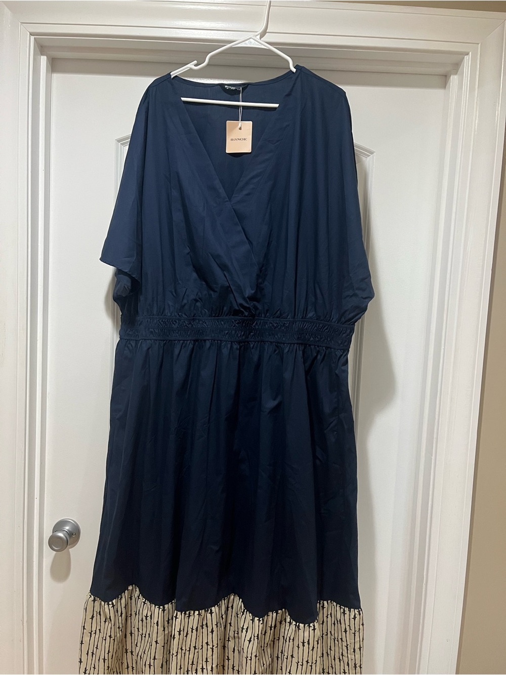 BloomChic Navy V-Neck Dress with Tag Detail